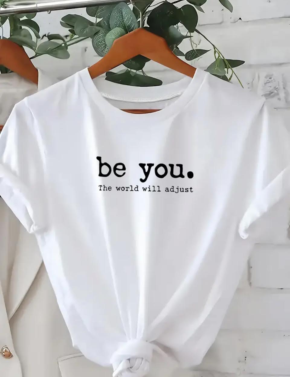 Women’s T-shirt - “Be You. The World Will Adjust.”